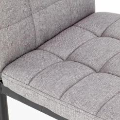 Garnero Arredamenti Sedie In Tessuto-Sedia da pranzo moderna in tessuto grigio e metallo nero Ylenia